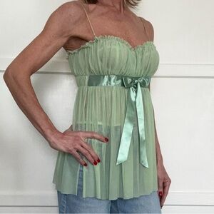 Bebe corset top with sheer accents and satin bow